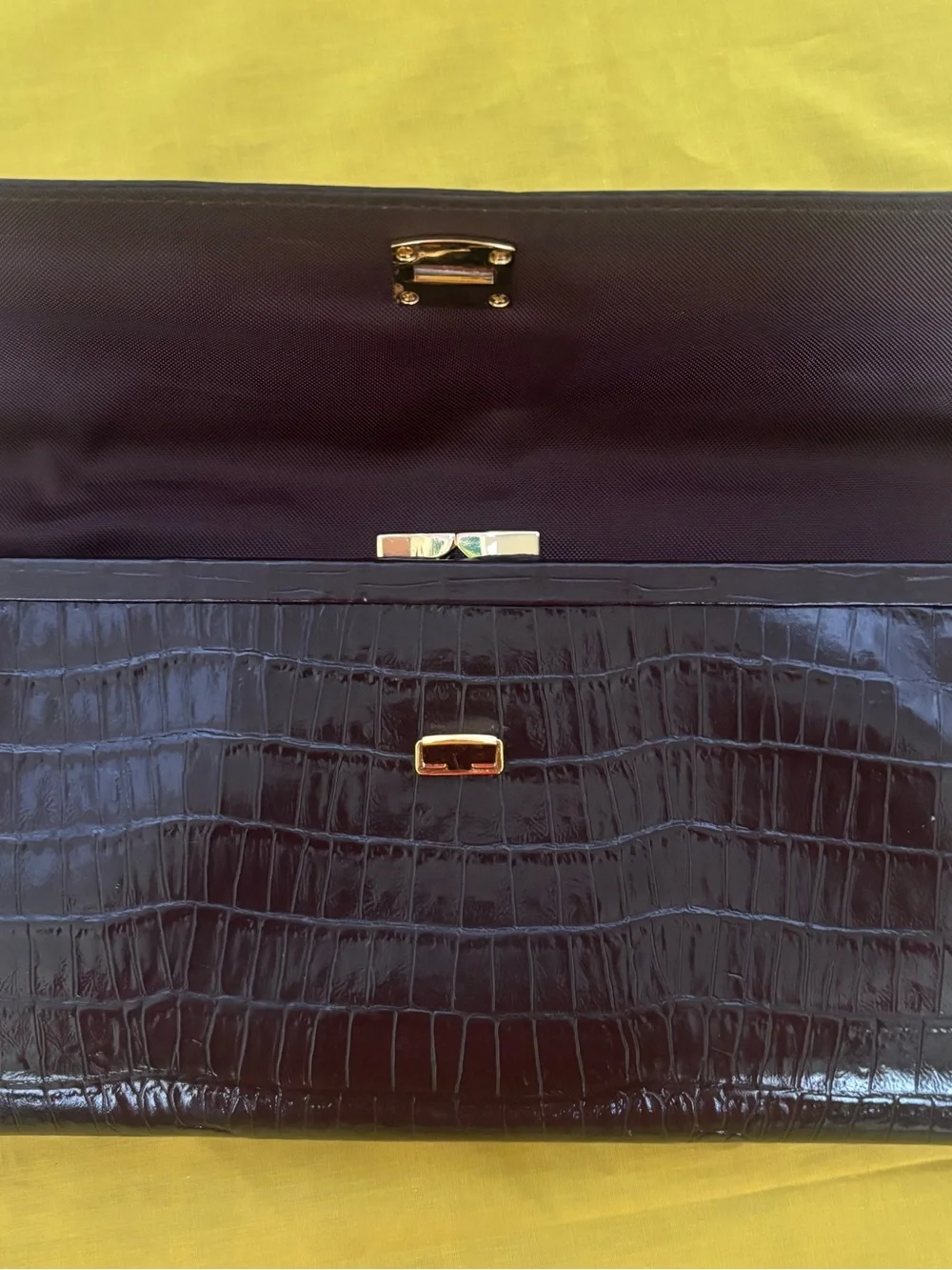 Structured Croc-Embossed Leather Clutch with Gold Hardware. Etienne Aigner